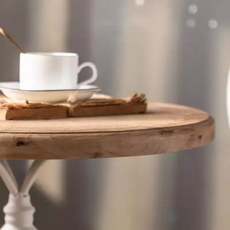 Table d'appoint sur pied noir et blanc
