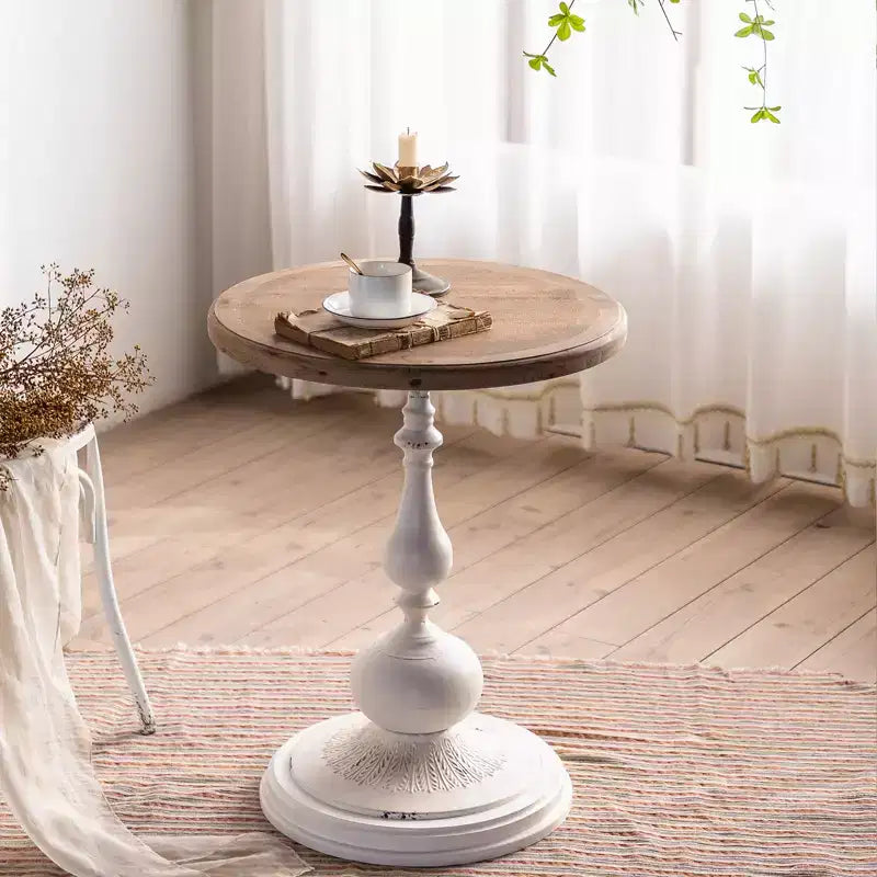 Table d'appoint sur pied noir et blanc