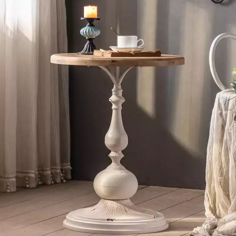 Table d'appoint sur pied noir et blanc