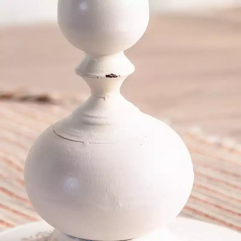Table d'appoint sur pied noir et blanc