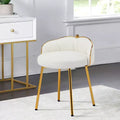 Jolie chaise de coiffeuse à pieds dorés